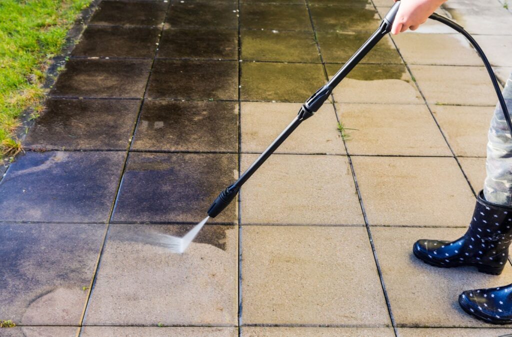 Discover the benefits of Upstate Softwash pressure washing in Rensselaer County, showcasing a freshly cleaned patio area.