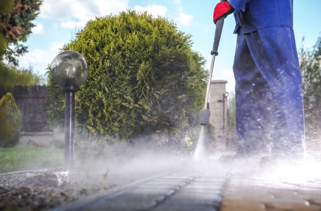 Upstate Softwash technician showcasing the benefits of pressure washing in Clifton Park, NY