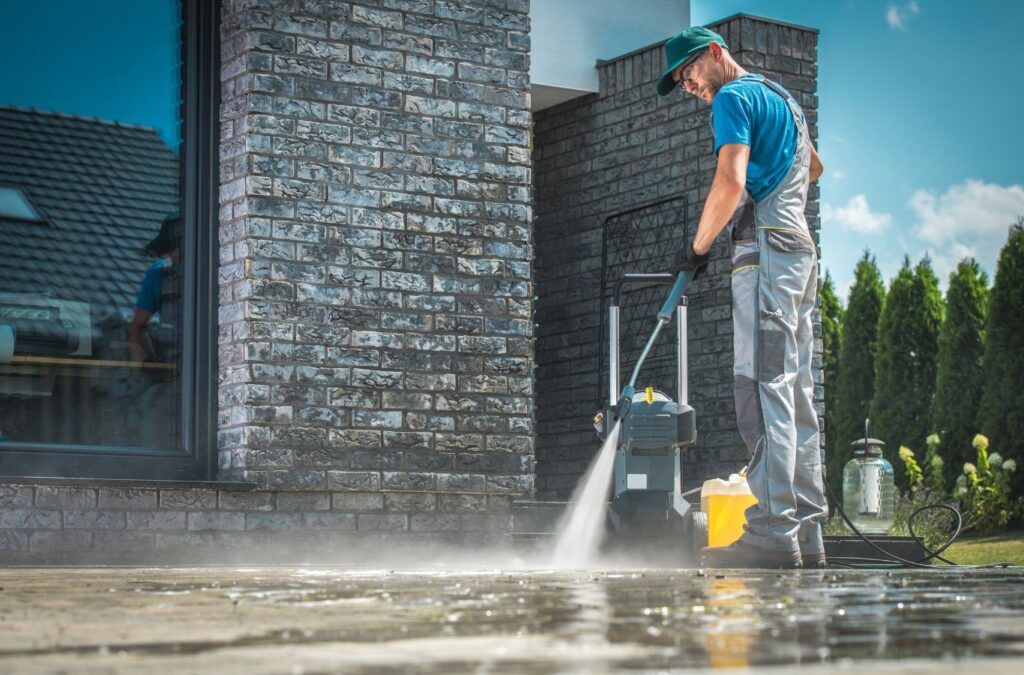 Upstate Softwash employee explaining the advantages of pressure washing in Saratoga Springs, NY by Upstate Softwash, Pressure Washing Near Me