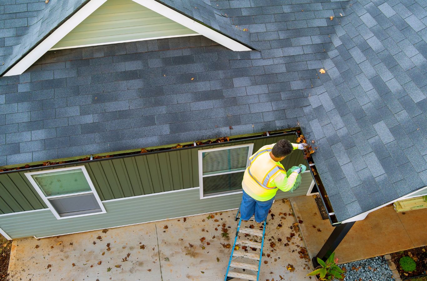 Professional gutter cleaning service being performed by Upstate Softwash in Saratoga Springs, NY.